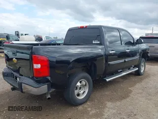 2013 Chevrolet Silverado 1500 LT with VIN 3GCPCSE06DG328373, listed as a IAAI auction lot 41451316 with 130,226 mi miles and . Bid and sale history available at DreamBid. Image 4.