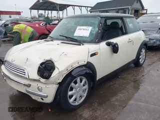 2004 MINI Hardtop with VIN WMWRC33434TJ60941, listed as a IAAI auction lot 39078161 with 143,107 mi miles and . Bid and sale history available at DreamBid. Image 21.
