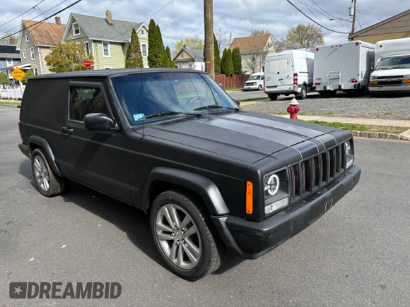 1997 Jeep Cherokee with VIN 1J4FT67S6VL571732, listed as a Copart auction lot 61440245 with 153,147 mi miles and Clean title. Bid and sale history available at DreamBid. Image 1.
