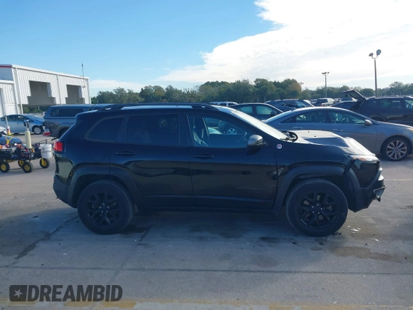 2018 Jeep Cherokee Trailhawk with VIN 1C4PJMBX3JD546332, listed as a IAAI auction lot 41269245 with 88,466 mi miles. Bid and sale history available at carsss.com. Image 13.