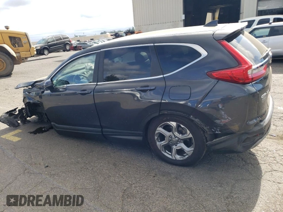 2018 Honda CR-V EX-L with VIN 2HKRW2H8XJH653774, listed as a Copart auction lot 67219913 with 90,506 mi miles and Salvage Title. Bid and sale history available at carsss.com. Image 2.