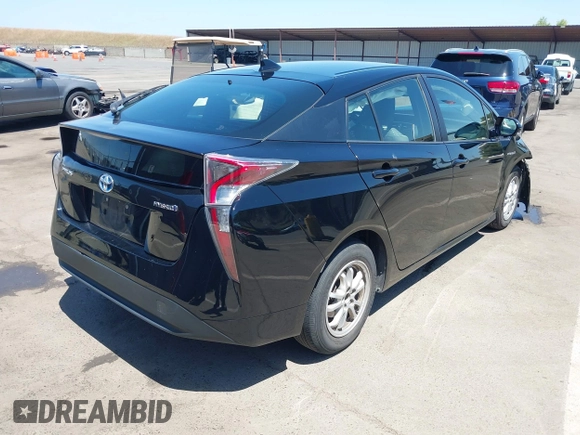 2016 Toyota Prius Four z VIN JTDKARFU7G3017018, wystawiony jako IAAI lot #42224376 z przebiegiem 74 136 mil mil oraz . Historia ofert i sprzedaży dostępna na DreamBid. Obrazek 4.