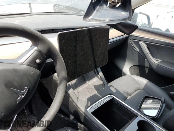 2023 Tesla Model Y Long Range with VIN 7SAYGDEE4PF899390, listed as a Copart auction lot 54361685 with Not Provided miles and Clean Title. Bid and sale history available at DreamBid. Image 9.