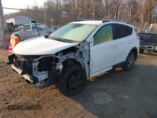 2017 Toyota RAV4 LE with VIN JTMZFREV7HJ120317, listed as a IAAI auction lot 41166489 with 144,799 mi miles and . Bid and sale history available at carsss.com. Image 18.