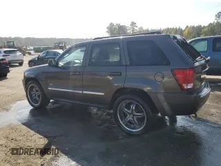 2006 Jeep Grand Cherokee Laredo with VIN 1J4HS48N96C357909, listed as a Copart auction lot 77551154 with 136,235 mi miles and Salvage Title. Bid and sale history available at carsss.com. Image 2.