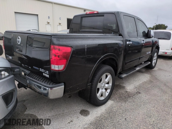 2010 Nissan Titan LE with VIN 1N6BA0EC8AN318538, listed as a Copart auction lot 74122194 with Not Provided miles and Salvage Title. Bid and sale history available at carsss.com. Image 3.