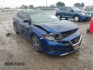 2020 Nissan Maxima SL z VIN 1N4AA6DV4LC374386, wystawiony jako IAAI lot #41027614 z przebiegiem 138 982 mil mil oraz . Historia ofert i sprzedaży dostępna na DreamBid. Obrazek 1.