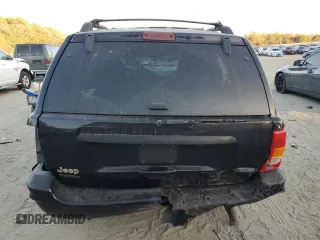 1999 Jeep Grand Cherokee Limited with VIN 1J4GW68S7XC676809, listed as a Copart auction lot 79059944 with 196,391 mi miles and Salvage Title. Bid and sale history available at carsss.com. Image 6.