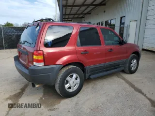 2004 Ford Escape XLS with VIN 1FMYU02144DA21005, listed as a Copart auction lot 45536325 with 189,661 mi miles and Salvage Title. Bid and sale history available at DreamBid. Image 3.