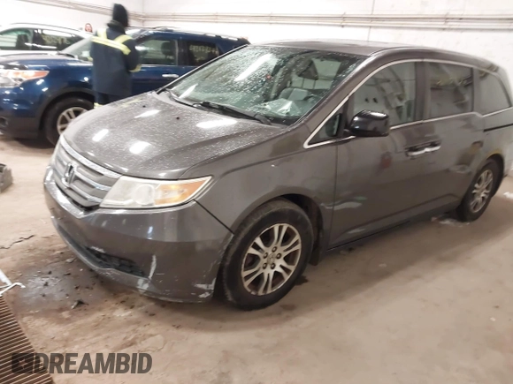 2011 Honda Odyssey EX-L with VIN 5FNRL5H67BB049446, listed as a IAAI auction lot 42116436 with 197,667 mi miles and . Bid and sale history available at carsss.com. Image 2.