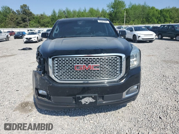 2015 GMC Yukon Denali z VIN 1GKS2CKJ8FR132636, wystawiony jako Copart lot #53567045 z przebiegiem 148 997 mil mil oraz Szkoda całkowita • Salvage title. Historia ofert i sprzedaży dostępna na DreamBid. Obrazek 5.