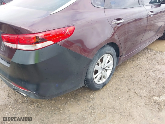 2016 Kia Optima LX with VIN 5XXGT4L3XGG027430, listed as a IAAI auction lot 41940146 with 75,456 mi miles. Bid and sale history available at carsss.com. Image 6.