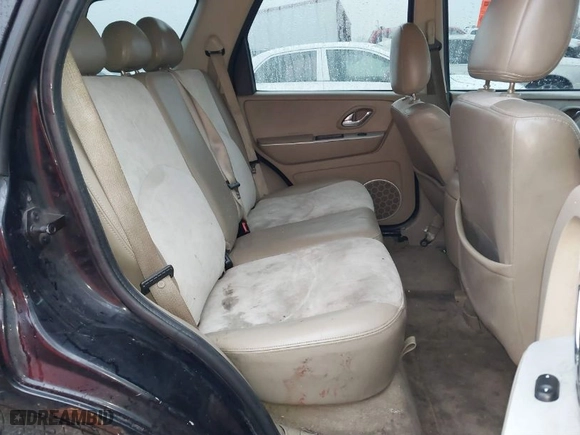 2007 Mercury Mariner Premier with VIN 4M2CU87167KJ19694, listed as a IAAI auction lot 41496611 with 219,031 mi miles. Bid and sale history available at carsss.com. Image 8.
