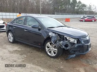 2014 Chevrolet Cruze LTZ z VIN 1G1PG5SB7E7335060, wystawiony jako IAAI lot #41710133 z przebiegiem 170 000 mil mil oraz . Historia ofert i sprzedaży dostępna na DreamBid. Obrazek 1.