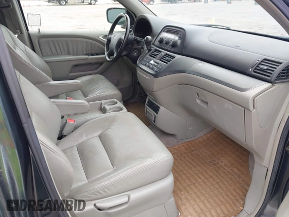 2006 Honda Odyssey EX-L with VIN 5FNRL38786B019441, listed as a IAAI auction lot 42074209 with 184,008 mi miles. Bid and sale history available at carsss.com. Image 5.