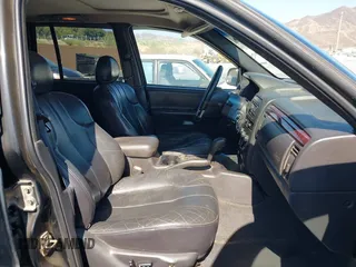 2000 Jeep Grand Cherokee Laredo with VIN 1J4GW48N0YC204645, listed as a IAAI auction lot 42650659 with 217,851 mi miles and . Bid and sale history available at DreamBid. Image 5.