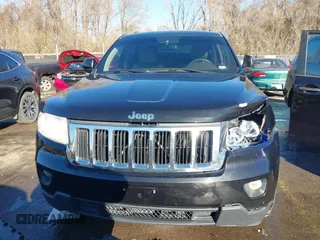 2011 Jeep Grand Cherokee 70th Anniversary with VIN 1J4RR4GT8BC504618, listed as a IAAI auction lot 40993960 with 188,098 mi miles. Bid and sale history available at carsss.com. Image 12.
