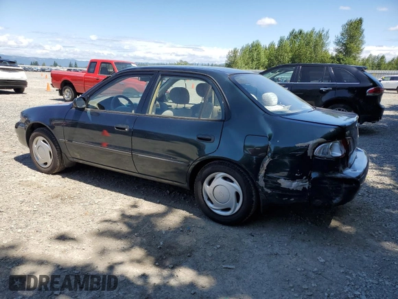 1999 Toyota Corolla VE with VIN 1NXBR12E7XZ240321, listed as a Copart auction lot 64259115 with 144,145 mi miles and Salvage title. Bid and sale history available at DreamBid. Image 2.