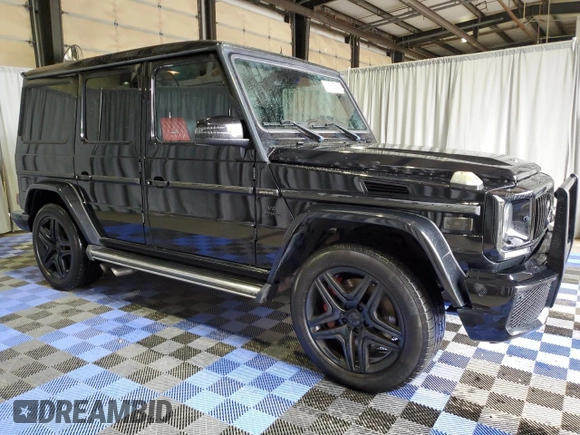 2014 Mercedes-Benz G 63 AMG with VIN WDCYC7DF9EX225480, listed as a Copart auction lot 77666574 with 116,967 mi miles and Clean title. Bid and sale history available at DreamBid. Image 4.