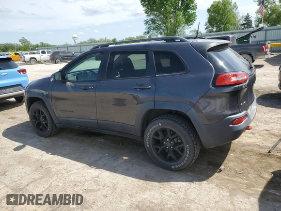 2017 Jeep Cherokee Trailhawk with VIN 1C4PJMBS0HW589626, listed as a Copart auction lot 53981435 with 105,318 mi miles and Salvage title. Bid and sale history available at DreamBid. Image 2.