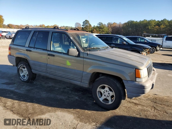1997 Jeep Grand Cherokee TSi with VIN 1J4FX58S4VC516340, listed as a Copart auction lot 84409044 with 256,300 mi miles and Clean Title. Bid and sale history available at carsss.com. Image 4.