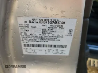 2010 Mazda Tribute Grand Touring with VIN 4F2CY0C74AKM03659, listed as a Copart auction lot 84494254 with 160,177 mi miles and Salvage Title. Bid and sale history available at carsss.com. Image 14.
