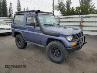 1995 Toyota Land Cruiser z VIN RJ700008084, wystawiony jako Copart lot #42412845 z przebiegiem 115 152 mil mil oraz Szkoda całkowita • Salvage title. Historia ofert i sprzedaży dostępna na DreamBid. Obrazek 4.