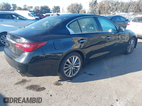 2023 Infiniti Q50 Luxe with VIN JN1EV7BP6PM513012, listed as a IAAI auction lot 41751813 with 7,064 mi miles and . Bid and sale history available at DreamBid. Image 4.