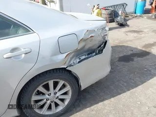 2014 Toyota Camry L with VIN 4T4BF1FK8ER387050, listed as a IAAI auction lot 41453516 with 184,150 mi miles. Bid and sale history available at carsss.com. Image 6.