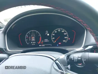 2022 Honda Civic Si with VIN 2HGFE1E52NH474042, listed as a IAAI auction lot 42099415 with 26,828 mi miles and . Bid and sale history available at DreamBid. Image 15.