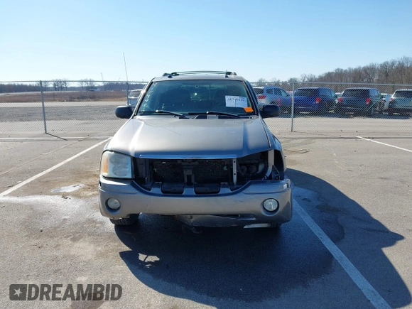 2005 GMC Envoy SLE z VIN 1GKDT13S252331044, wystawiony jako IAAI lot #41749219 z przebiegiem 263 876 mil mil oraz . Historia ofert i sprzedaży dostępna na DreamBid. Obrazek 13.