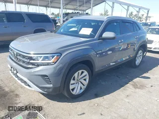 2021 Volkswagen Atlas SE with VIN 1V2WE2CA9MC234751, listed as a IAAI auction lot 41979424 with 30,132 mi miles and . Bid and sale history available at DreamBid. Image 2.