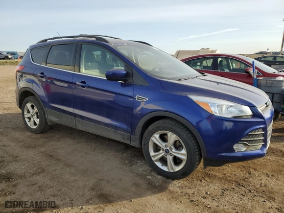2015 Ford Escape SE with VIN 1FMCU9GX4FUA01111, listed as a Copart auction lot 52064315 with 238,817 mi miles and Clean Title. Bid and sale history available at carsss.com. Image 4.
