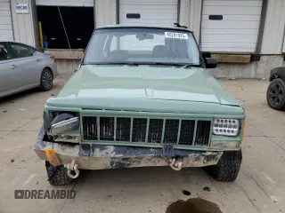 1996 Jeep Cherokee Country with VIN 1J4FJ78S3TL180304, listed as a Copart auction lot 45291925 with 162,876 mi miles and Salvage Title. Bid and sale history available at carsss.com. Image 5.