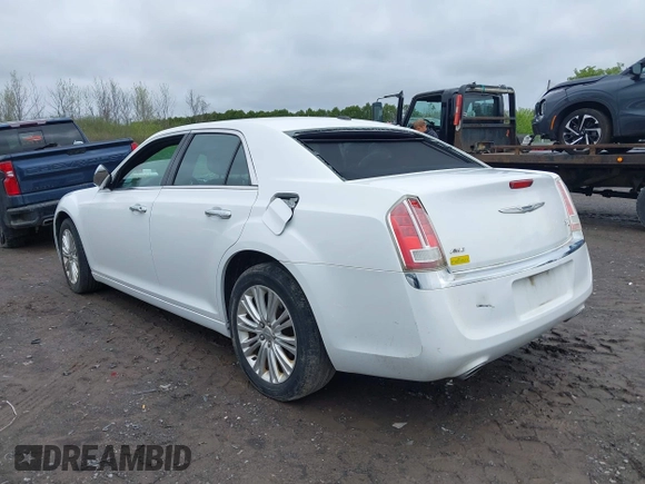 2014 Chrysler 300 C with VIN 2C3CCAKG5EH200996, listed as a IAAI auction lot 42201747 with 156,121 mi miles and . Bid and sale history available at carsss.com. Image 3.