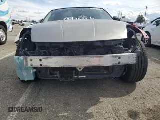2004 Nissan 350Z Touring with VIN JN1AZ34D94M101807, listed as a Copart auction lot 51105905 with 164,999 mi miles and Salvage Title. Bid and sale history available at carsss.com. Image 5.
