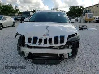 2019 Jeep Cherokee Latitude Plus z VIN 1C4PJLLB4KD324381, wystawiony jako Copart lot #44211445 z przebiegiem 111 684 mil mil oraz Nie do naprawy • Non repairable. Historia ofert i sprzedaży dostępna na DreamBid. Obrazek 14.