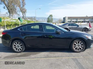2016 Mazda 6 i Sport with VIN JM1GJ1U51G1445925, listed as a IAAI auction lot 41980386 with Not Provided miles and . Bid and sale history available at DreamBid. Image 12.