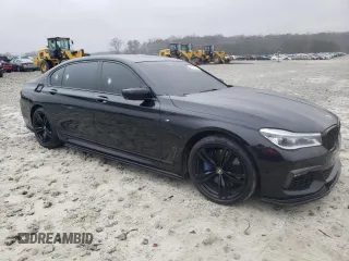 2018 BMW 7 Series 750i with VIN WBA7F0C51JGM22515, listed as a Copart auction lot 86486914 with 0 mi miles and Salvage Title. Bid and sale history available at carsss.com. Image 4.