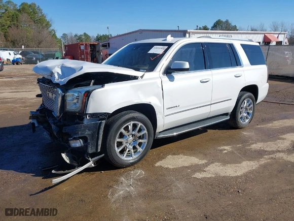 2016 GMC Yukon Denali with VIN 1GKS2CKJ7GR476072, listed as a IAAI auction lot 41611329 with 152,052 mi miles. Bid and sale history available at carsss.com. Image 2.