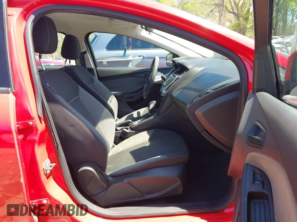 2012 Ford Focus SE z VIN 1FAHP3F23CL333598, wystawiony jako IAAI lot #41970172 z przebiegiem 209 969 mil mil oraz . Historia ofert i sprzedaży dostępna na DreamBid. Obrazek 5.