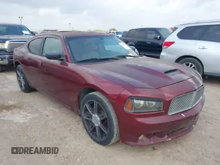 2006 Dodge Charger R/T with VIN 2B3KA53H36H260418, listed as a IAAI auction lot 42126007 with 242,331 mi miles and . Bid and sale history available at carsss.com. Image 1.