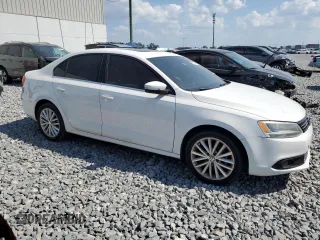 2011 Volkswagen Jetta SEL z VIN 3VWLX7AJ2BM351398, wystawiony jako Copart lot #57559365 z przebiegiem 183 376 mil mil oraz Czysty tytuł • Clean title. Historia ofert i sprzedaży dostępna na DreamBid. Obrazek 4.