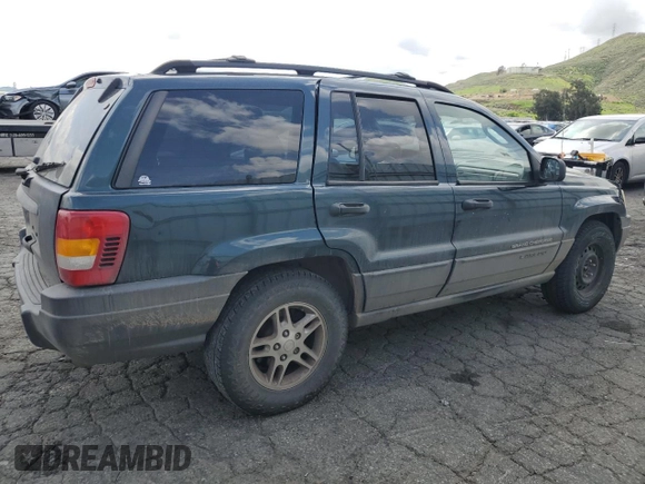 2004 Jeep Grand Cherokee Laredo with VIN 1J4GX48N94C397241, listed as a Copart auction lot 49183315 with 189,099 mi miles and Salvage title. Bid and sale history available at DreamBid. Image 3.