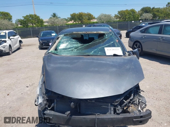 2015 Toyota Corolla L with VIN 2T1BURHEXFC449900, listed as a IAAI auction lot 42128227 with 127,479 mi miles and . Bid and sale history available at DreamBid. Image 6.