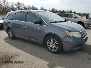 2012 Honda Odyssey EX-L with VIN 5FNRL5H68CB105623, listed as a Copart auction lot 55166905 with 147,417 mi miles and Salvage Title. Bid and sale history available at carsss.com. Image 4.