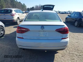 2019 Volkswagen Passat 2.0T Wolfsburg Edition with VIN 1VWLA7A32KC000818, listed as a IAAI auction lot 41711518 with 87,873 mi miles. Bid and sale history available at carsss.com. Image 16.