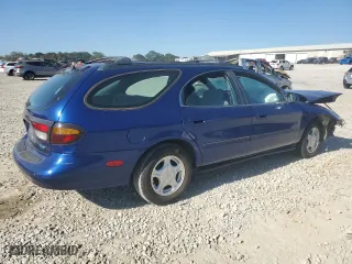 1997 Ford Taurus GL with VIN 1FALP57U2VA153212, listed as a Copart auction lot 75761034 with 167,802 mi miles and Salvage Title. Bid and sale history available at carsss.com. Image 3.