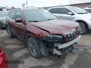 2019 Jeep Cherokee Latitude Plus z VIN 1C4PJLLBXKD420578, wystawiony jako IAAI lot #41462302 z przebiegiem 116 277 mil mil oraz . Historia ofert i sprzedaży dostępna na DreamBid. Obrazek 1.