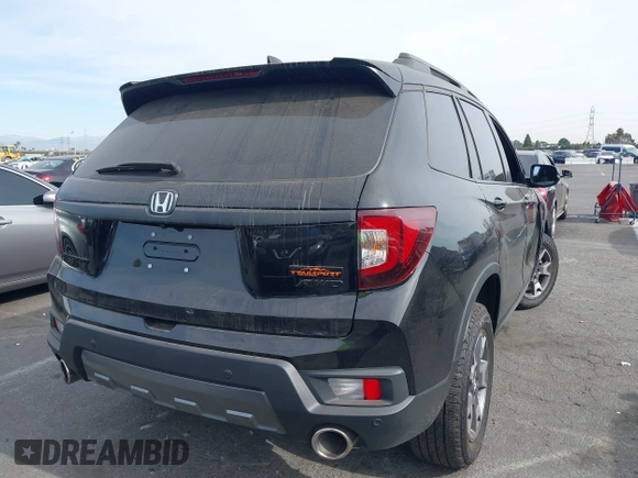 2023 Honda Passport TrailSport with VIN 5FNYF8H63PB033062, listed as a IAAI auction lot 41399396 with 17,829 mi miles and . Bid and sale history available at carsss.com. Image 4.